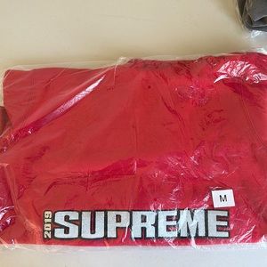 Supreme red/metallic silver blockbuster hoodie.